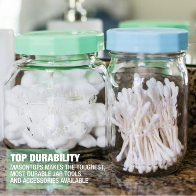 mason jars with bathroom accessories and tough tops on on a bathroom counter