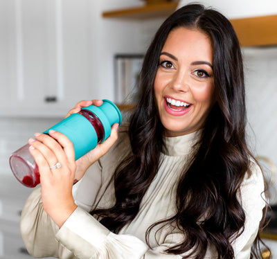 woman shaking the cocktail shaker